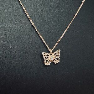 Gold tone butterfly necklace and earrings set